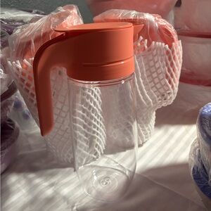 Tupperware Orange Pitcher